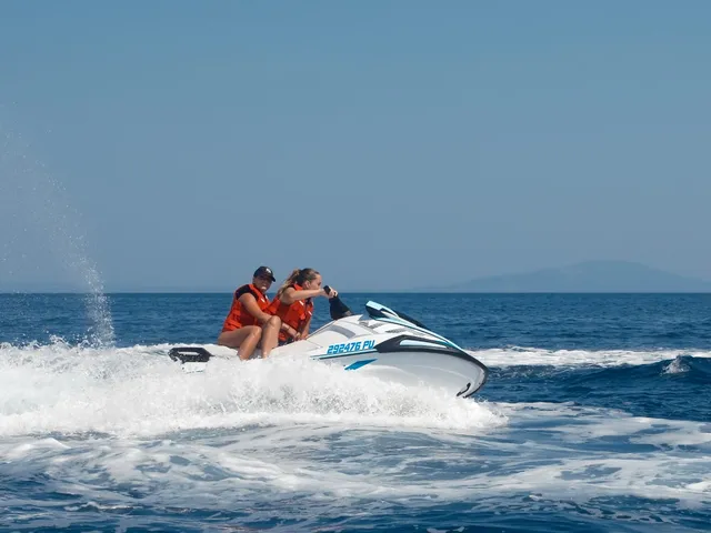 Side-profile of a couple at speed