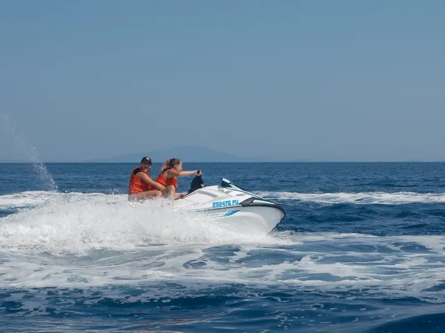 Couple enjoying spray