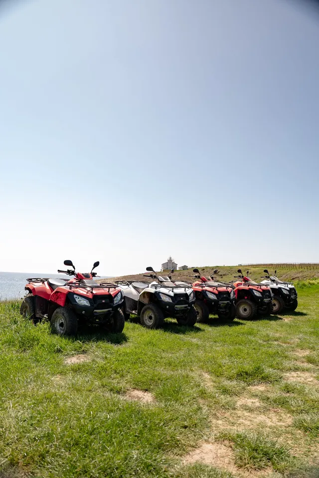 Quad fleet parked on a coastal cape