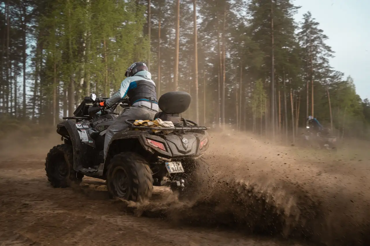 Quad / ATV in action on a backcountry trail